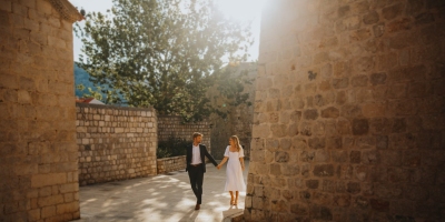 Hidden corners in Karmen, Dubrovnik Old town, romantic portrait of a beautiful couple