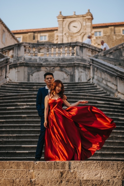 Jesuit stairs in Dubrovnik, Walk of shame, portrait of a couple during our morning photo shoot, lovely red dress