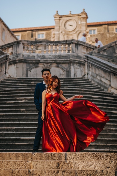 Jesuit stairs in Dubrovnik, Walk of shame, portrait of a couple during our morning photo shoot, lovely red dress