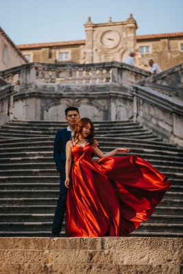 Jesuit stairs in Dubrovnik, Walk of shame, portrait of a couple during our morning photo shoot, lovely red dress