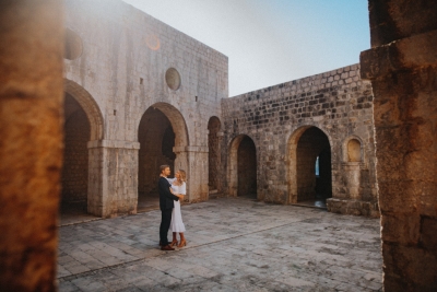 St. Lawrence fortress in Dubrovnik, just married couple on a morning photo shoot
