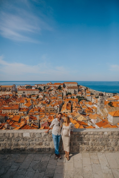 Dubrovnik City Walls in the morning, Old town red roofs, blue sea and sky in the background. Photo shoot with a beautiful couple. Maternity, Game of Thrones
