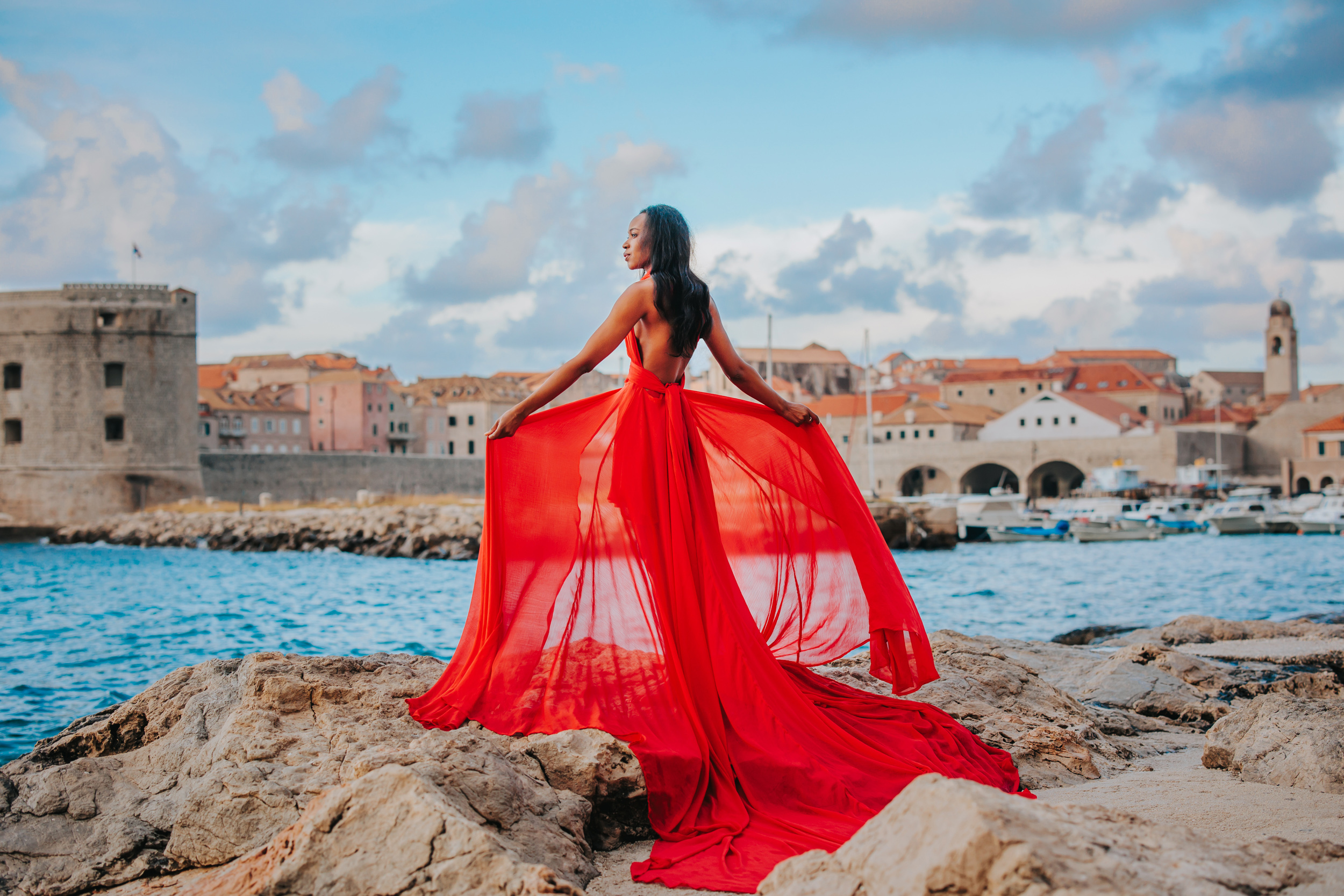 Long flying dress shoot in Dubrovnik Panoramic view from Srd hill above Dubrovnik